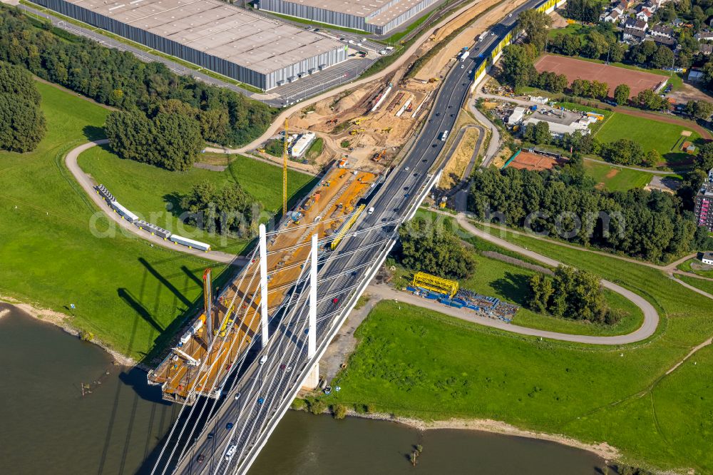 Duisburg from the bird's eye view: Construction site for the rehabilitation and repair of the motorway bridge construction Rheinbruecke Duisburg-Neuenkamp in the district Kasslerfeld in Duisburg at Ruhrgebiet in the state North Rhine-Westphalia, Germany