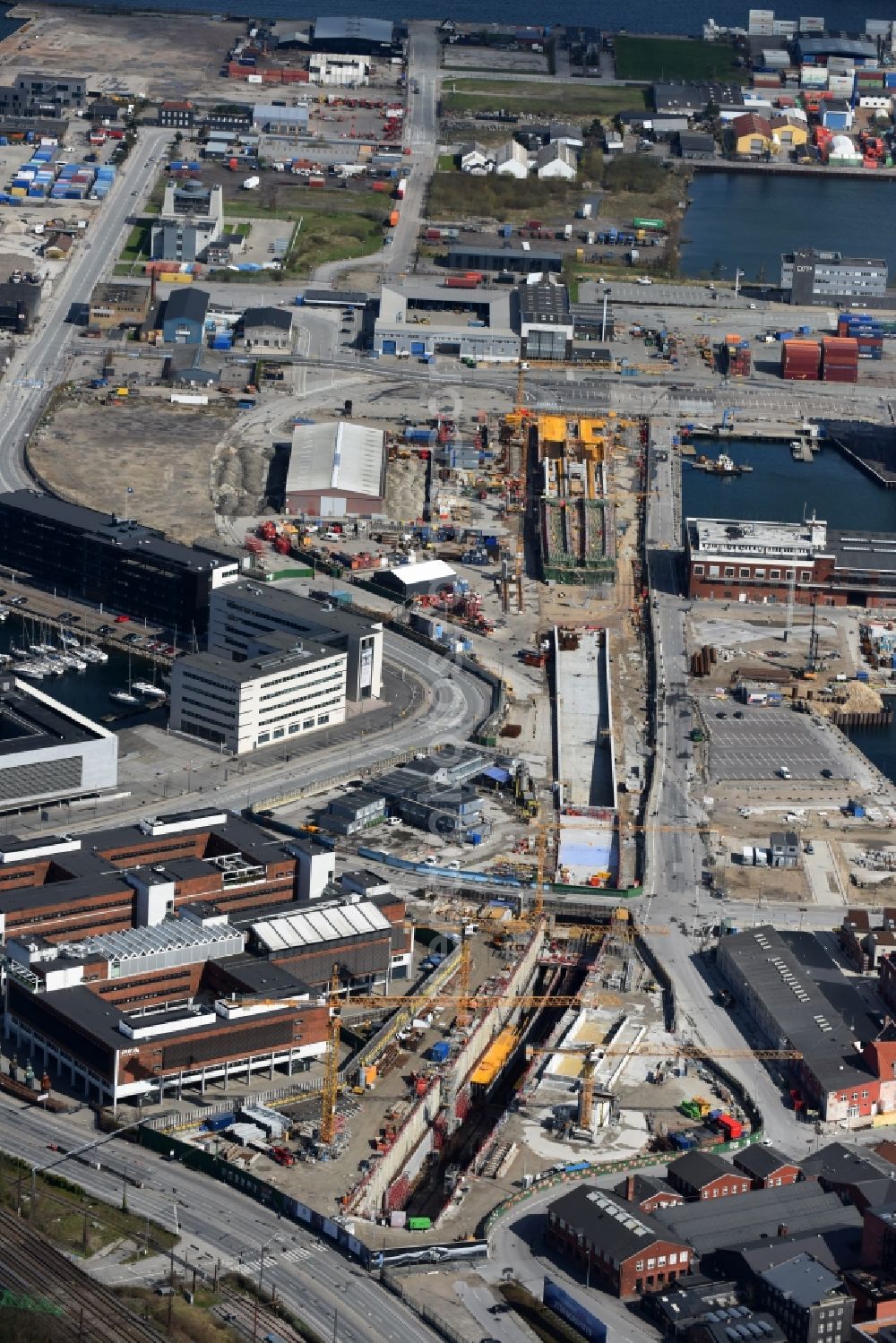 Kopenhagen from the bird's eye view: Construction site for new train- tunnel construction of ARGE MetNord JV and Zueblin A/S and Hochtief Solution AG in Copenhagen in Denmark