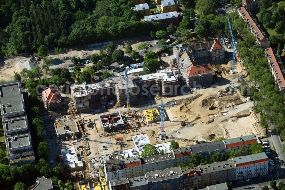 Aerial photograph Berlin - Construction for the reconstruction and expansion of the old buildings listed building of AVILA Projektmanagement GmbH on Mariendorfer Weg in the district Neukoelln in Berlin