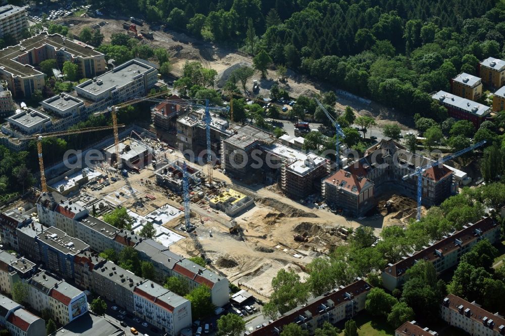 Aerial photograph Berlin - Construction for the reconstruction and expansion of the old buildings listed building of AVILA Projektmanagement GmbH on Mariendorfer Weg in the district Neukoelln in Berlin