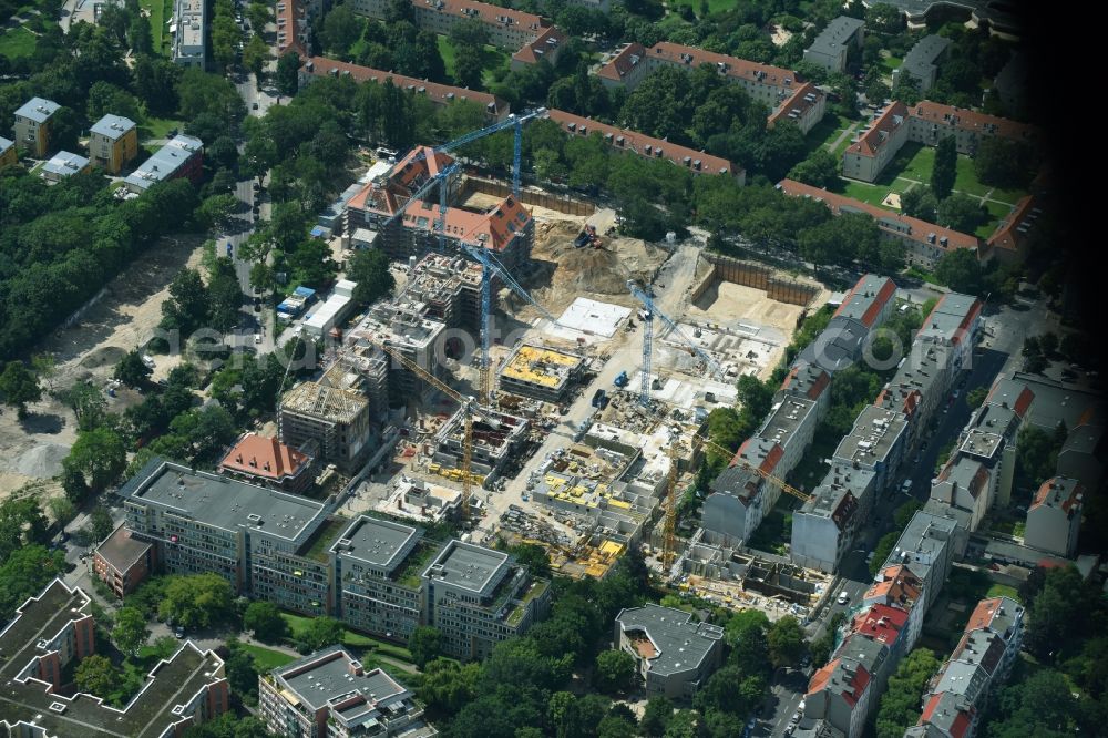 Berlin from the bird's eye view: Construction for the reconstruction and expansion of the old buildings listed building of AVILA Projektmanagement GmbH on Mariendorfer Weg in the district Neukoelln in Berlin