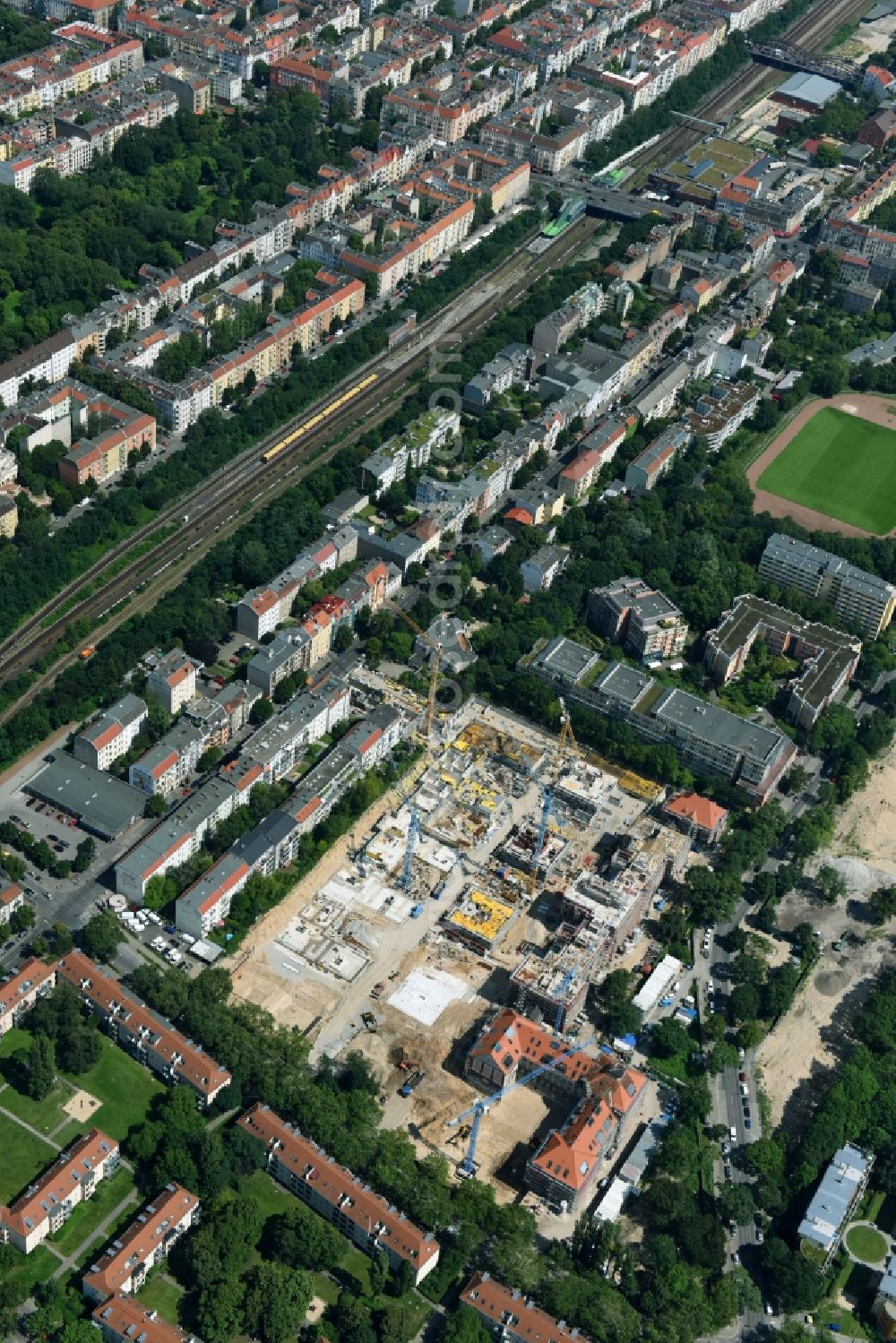 Aerial photograph Berlin - Construction for the reconstruction and expansion of the old buildings listed building of AVILA Projektmanagement GmbH on Mariendorfer Weg in the district Neukoelln in Berlin