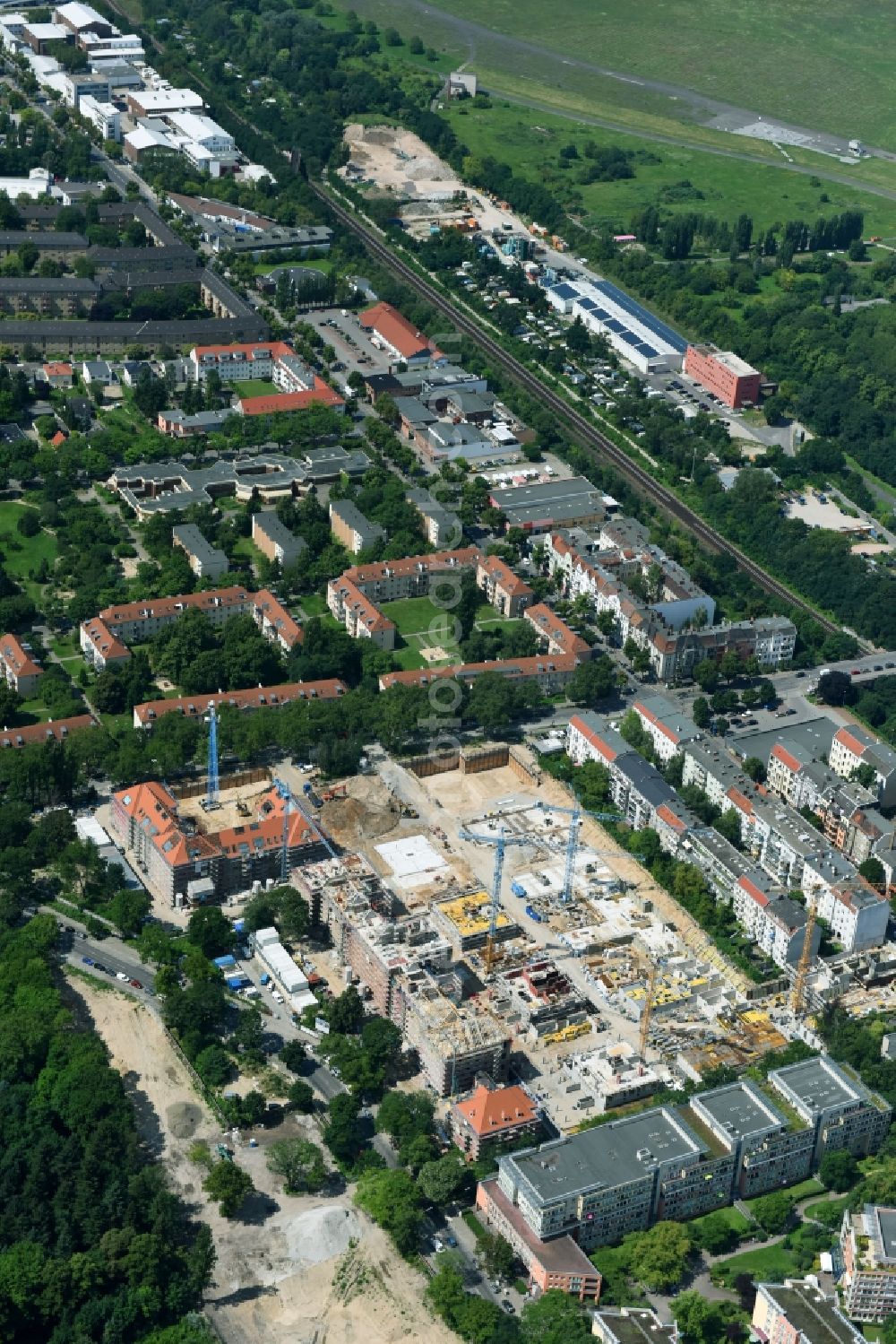 Aerial photograph Berlin - Construction for the reconstruction and expansion of the old buildings listed building of AVILA Projektmanagement GmbH on Mariendorfer Weg in the district Neukoelln in Berlin