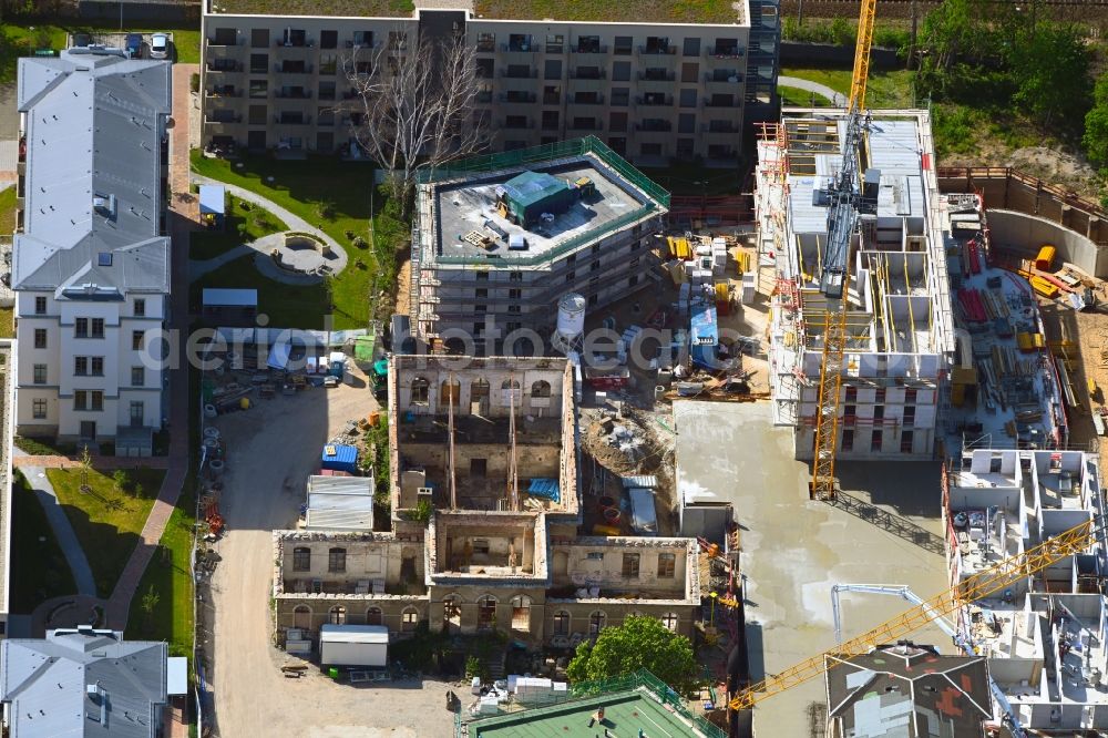 Aerial image Dresden - Construction for the reconstruction and expansion of the old buildings listed building Ehemalige Arbeitsanstalt in of Koenigsbruecker Strasse in the district Albertstadt in Dresden in the state Saxony, Germany