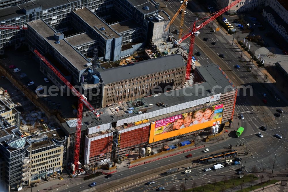 Aerial image Leipzig - Construction for the reconstruction and expansion of the old buildings listed building of Firma REINBAU GmbH on Georgiring corner Grimmaischer Steinweg and Querstrasse in the district Mitte in Leipzig in the state Saxony