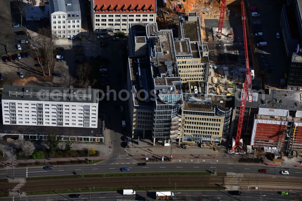 Aerial photograph Leipzig - Construction for the reconstruction and expansion of the old buildings listed building of Firma REINBAU GmbH on Georgiring corner Grimmaischer Steinweg and Querstrasse in the district Mitte in Leipzig in the state Saxony