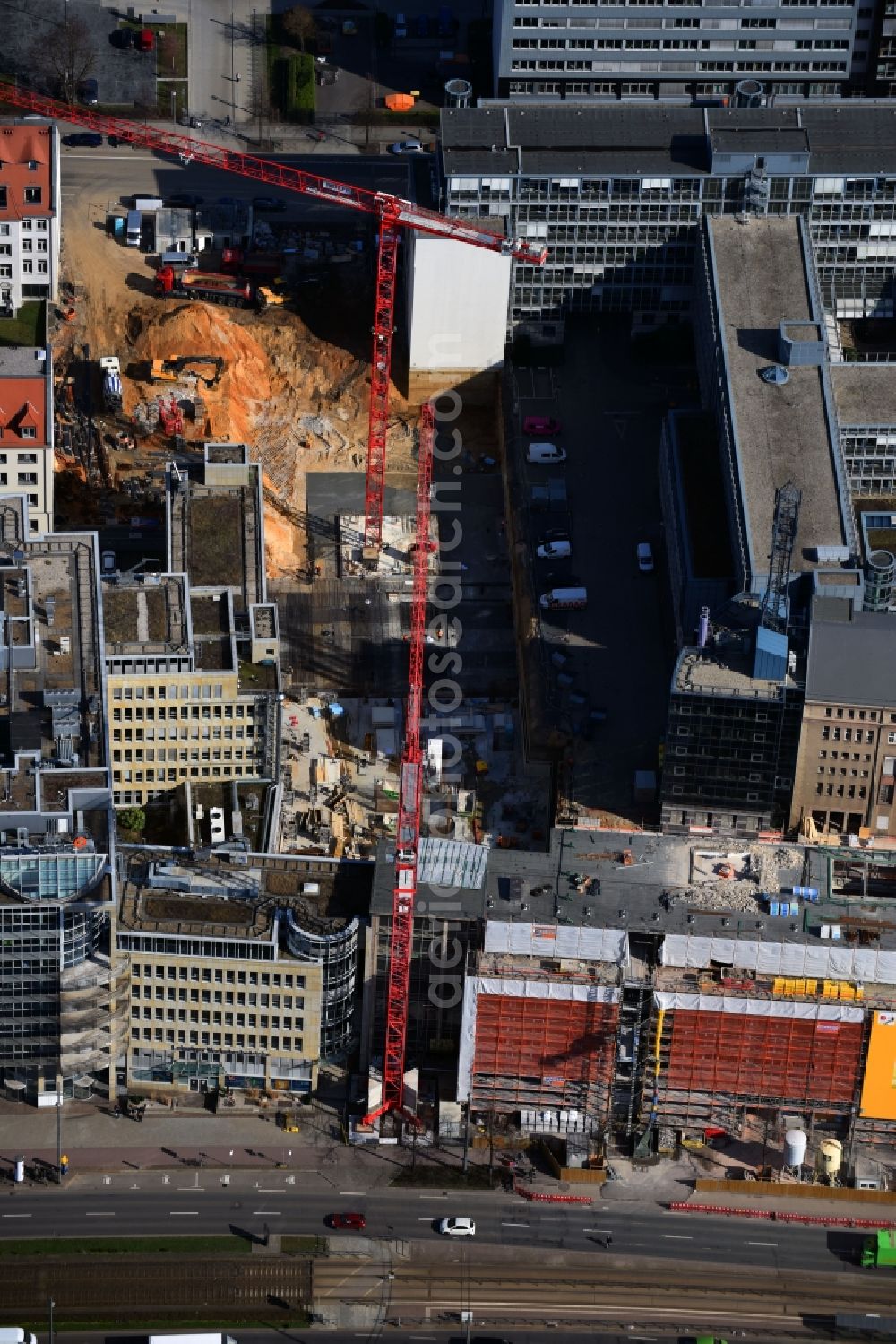 Leipzig from the bird's eye view: Construction for the reconstruction and expansion of the old buildings listed building of Firma REINBAU GmbH on Georgiring corner Grimmaischer Steinweg and Querstrasse in the district Mitte in Leipzig in the state Saxony