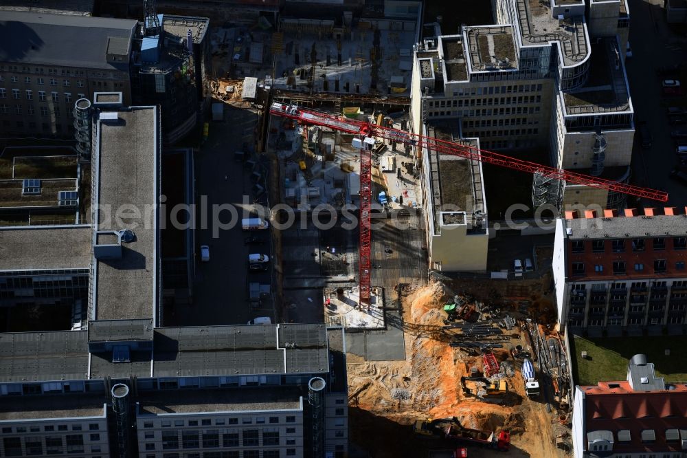 Leipzig from the bird's eye view: Construction for the reconstruction and expansion of the old buildings listed building of Firma REINBAU GmbH on Georgiring corner Grimmaischer Steinweg and Querstrasse in the district Mitte in Leipzig in the state Saxony