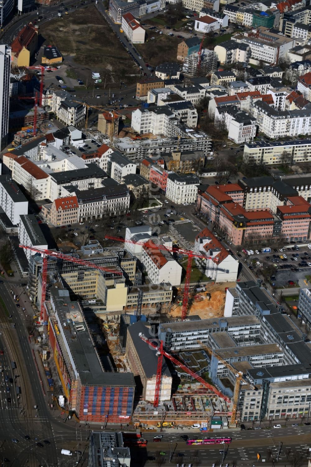 Leipzig from the bird's eye view: Construction for the reconstruction and expansion of the old buildings listed building of Firma REINBAU GmbH on Georgiring corner Grimmaischer Steinweg and Querstrasse in the district Mitte in Leipzig in the state Saxony