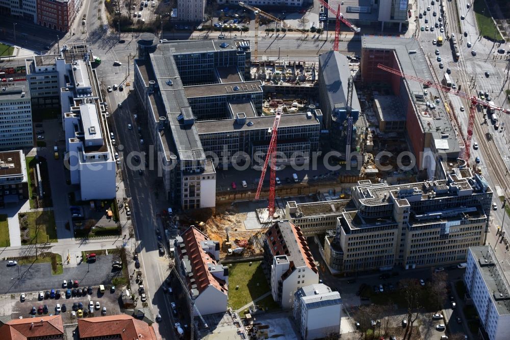 Leipzig from the bird's eye view: Construction for the reconstruction and expansion of the old buildings listed building of Firma REINBAU GmbH on Georgiring corner Grimmaischer Steinweg and Querstrasse in the district Mitte in Leipzig in the state Saxony