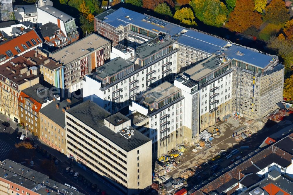 Berlin from above - Construction for the reconstruction and expansion of the old buildings listed building Metropol Park in Areal Am Koellnischen Park - Wassergasse - Schulze-Delitzsch-Platz in the district Mitte in Berlin, Germany