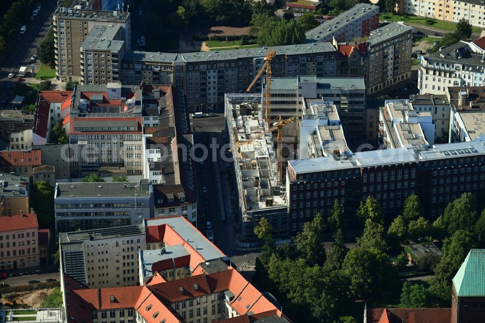 Aerial photograph Berlin - Construction for the reconstruction and expansion of the old buildings listed building Metropol Park in Areal Am Koellnischen Park - Wassergasse - Schulze-Delitzsch-Platz in the district Mitte in Berlin, Germany