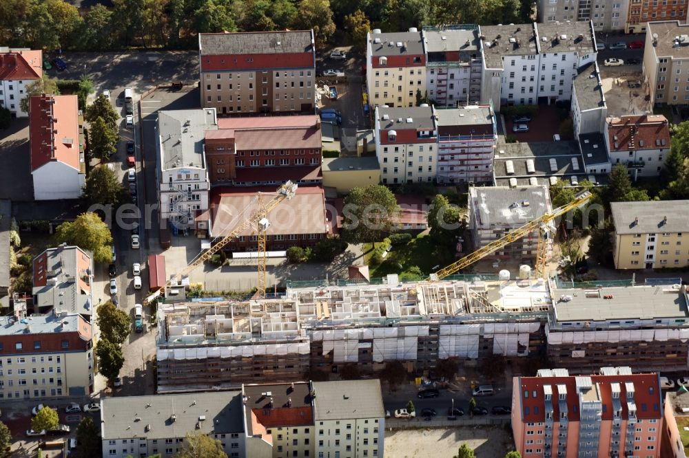 Aerial photograph Berlin - Construction for the reconstruction and expansion of the old buildings listed building an der Buergerstrasse - Mackenroder Weg - Jahnstrasse in Berlin