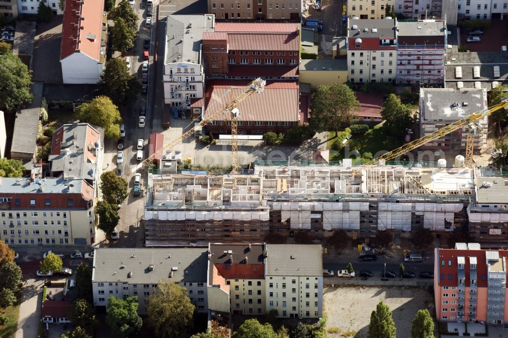 Berlin from above - Construction for the reconstruction and expansion of the old buildings listed building an der Buergerstrasse - Mackenroder Weg - Jahnstrasse in Berlin