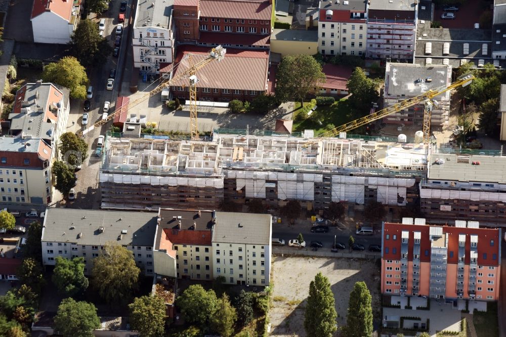 Berlin from the bird's eye view: Construction for the reconstruction and expansion of the old buildings listed building an der Buergerstrasse - Mackenroder Weg - Jahnstrasse in Berlin