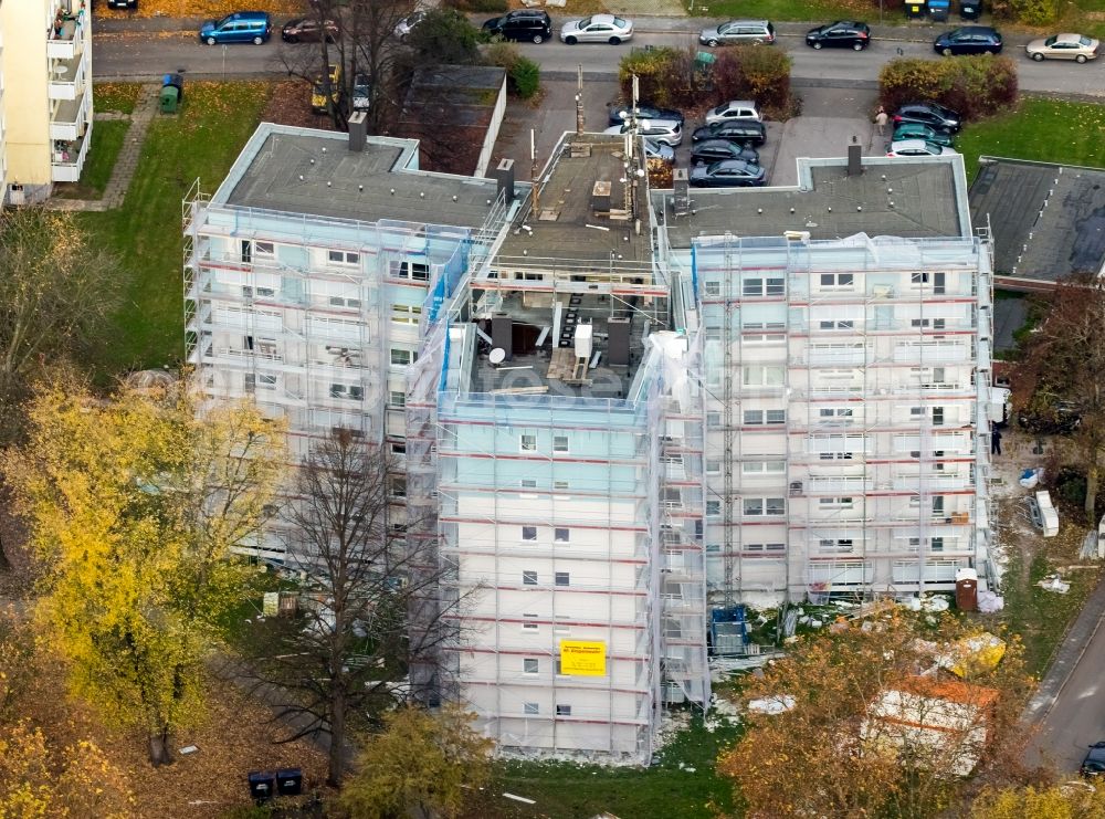 Bochum from the bird's eye view: Construction for the reconstruction and expansion of the VONOVIA-high-rise at the Weitmarer street in Bochum in the state North Rhine-Westphalia