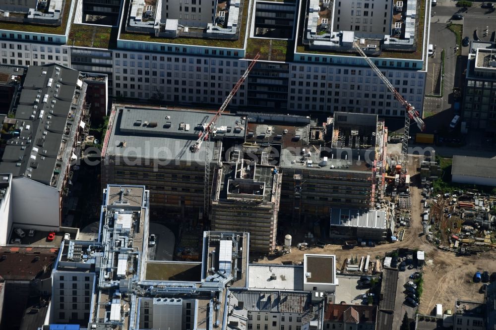 Berlin from above - Construction site of redevelopments of the former opera workshops to the actor's school Hochschule fuer Schauspielkunst Ernst Busch (HfS) on Zinnowitzer Strasse in the Mitte part of Berlin