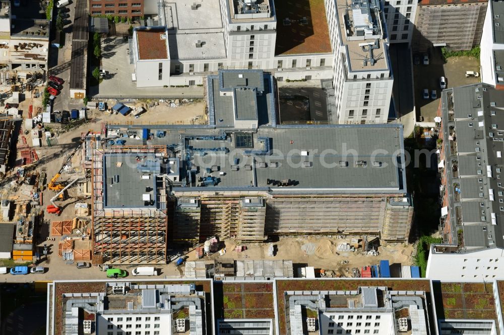 Berlin from above - Construction site of redevelopments of the former opera workshops to the actor's school Hochschule fuer Schauspielkunst Ernst Busch (HfS) on Zinnowitzer Strasse in the Mitte part of Berlin