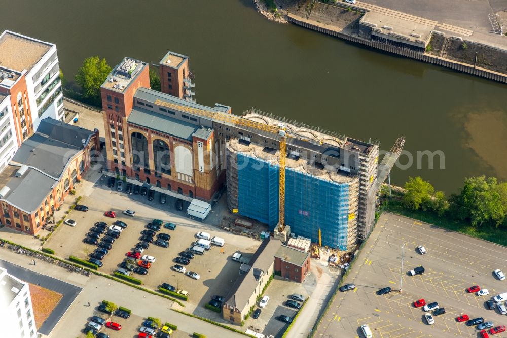 Düsseldorf from the bird's eye view: Construction site for the conversion of the former Plange mill to an office and commercial building in Dusseldorf in the federal state of North Rhine-Westphalia, Germany