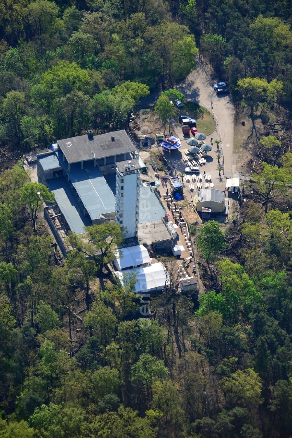 Aerial image Berlin - Site for the reconstruction of the tower- building ensemble of Mueggelturm in the forest Mueggelbergen Koepenick in Berlin