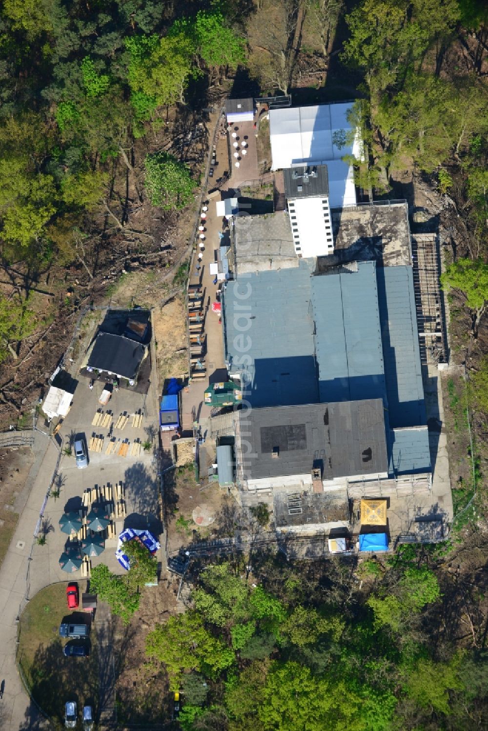 Aerial photograph Berlin - Site for the reconstruction of the tower- building ensemble of Mueggelturm in the forest Mueggelbergen Koepenick in Berlin