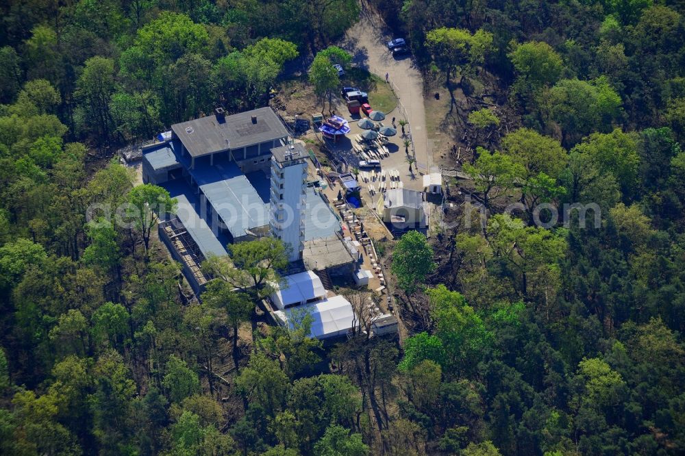 Aerial photograph Berlin - Site for the reconstruction of the tower- building ensemble of Mueggelturm in the forest Mueggelbergen Koepenick in Berlin