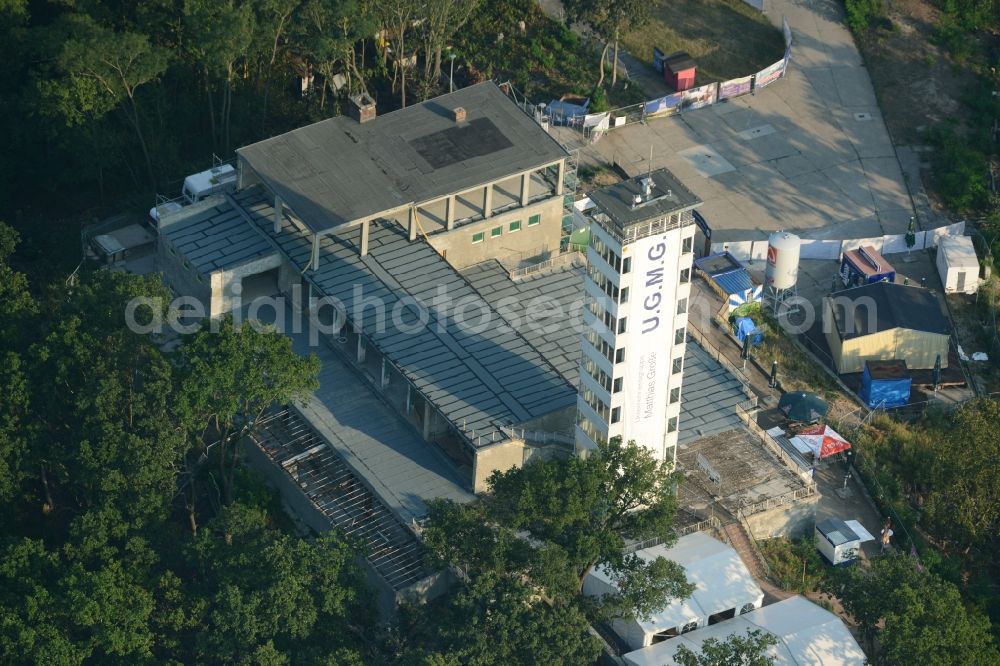 Aerial photograph Berlin - Site for the reconstruction of the tower- building ensemble of Mueggelturm in the forest Mueggelbergen Koepenick in Berlin