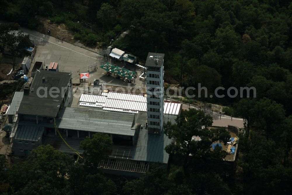 Berlin from the bird's eye view: Site for the reconstruction of the tower- building ensemble of Mueggelturm in the forest Mueggelbergen Koepenick in Berlin