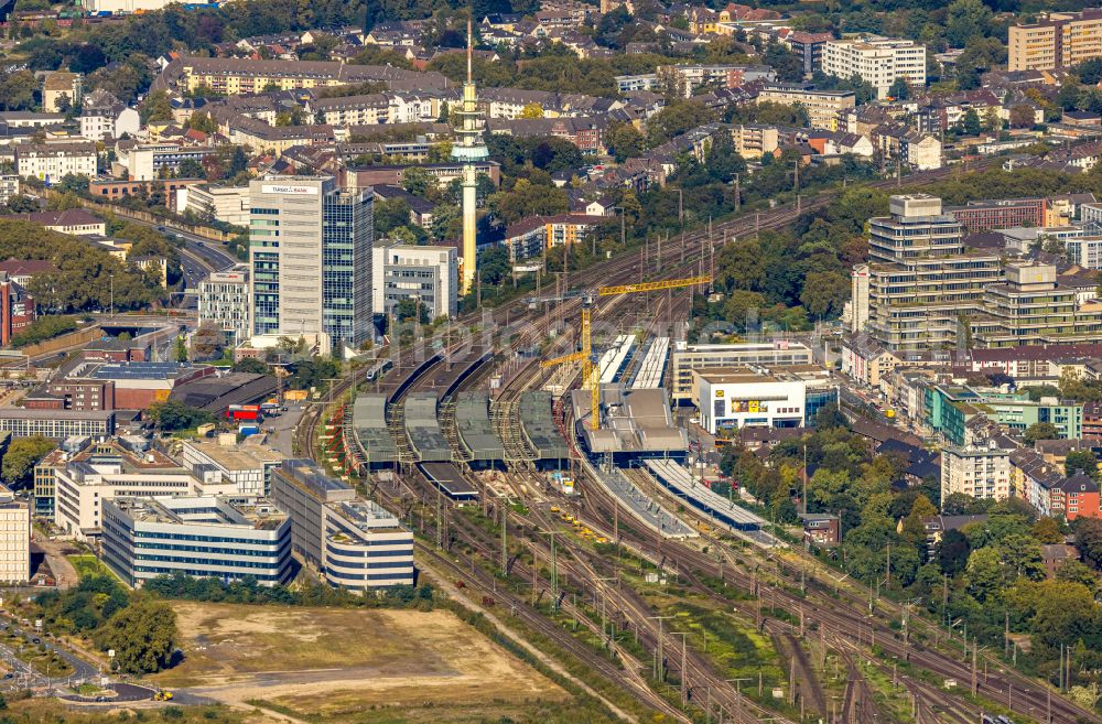 Duisburg from the bird's eye view: Construction site for the conversion of the main train station of the Deutsche Bahn Duisburger Welle on Otto-Keller-Strasse in the district of Dellviertel in Duisburg in the Ruhr area in the state North Rhine-Westphalia, Germany