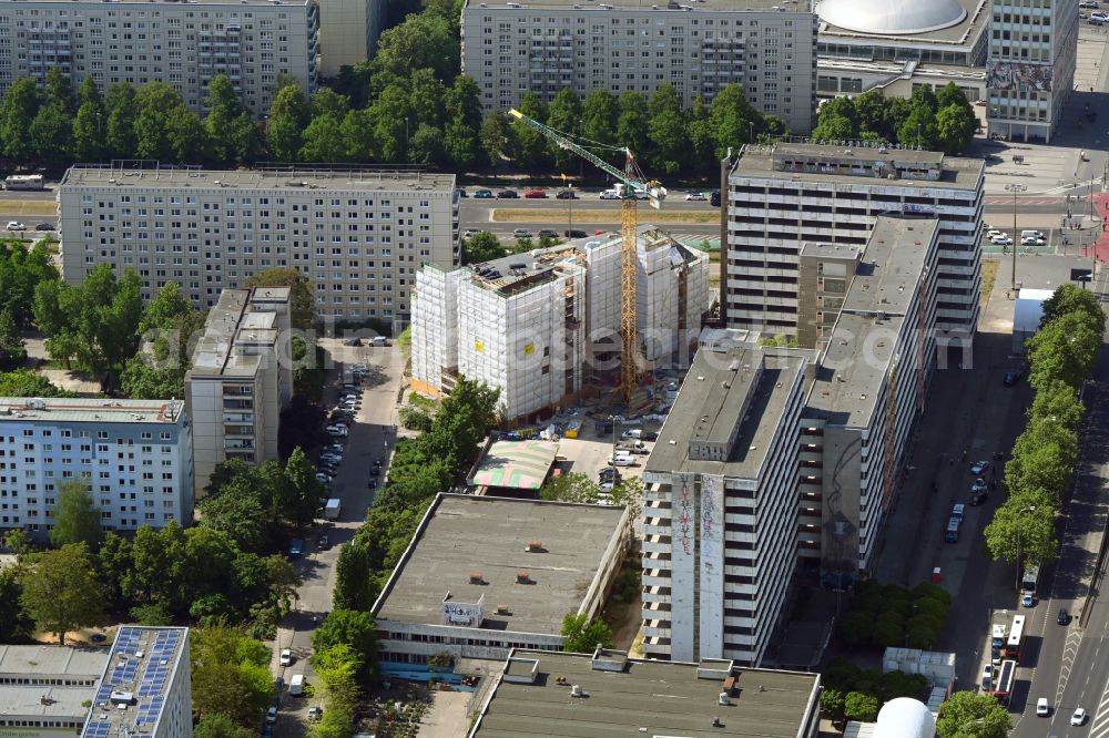 Berlin from above - Construction for the reconstruction Haus of Gesundheit on street Karl-Marx-Allee in the district Mitte in Berlin, Germany