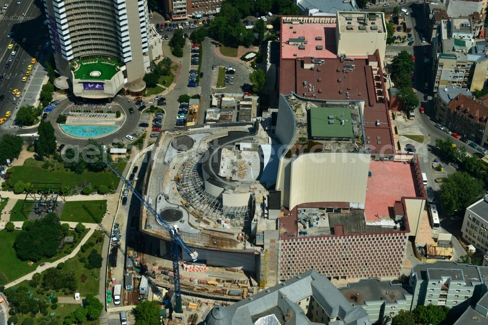 Aerial image Bukarest - Construction site for remodeling and new building of the Opera National Theatre on Bulevardul Nicolae Balcescu in the city center of the capital city of Bucharest in Romania