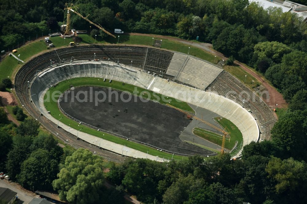 Aerial photograph Chemnitz - Construction site for the restoration and redevelopment of the bicycle race track in the Bernsdorf part of Chemnitz in the state of Saxony. The concrete oval track is being refurbished