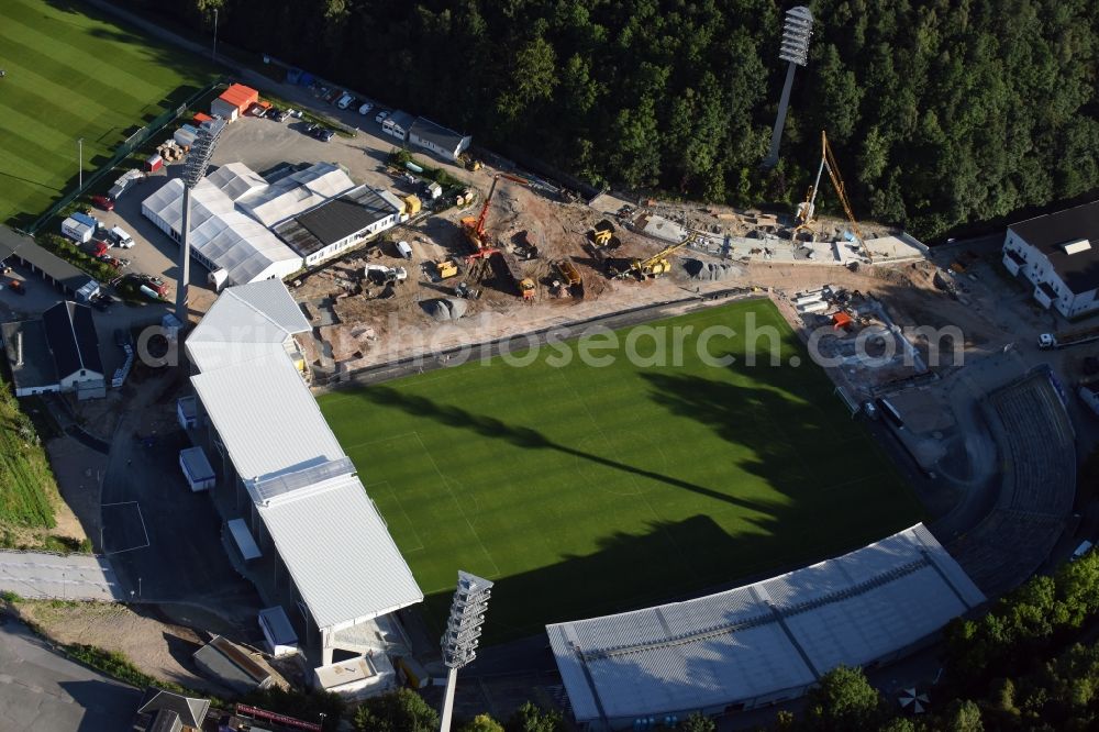 Aue from above - Construction for the reconstruction of the Sparkassen-Erzgebirgsstadium of the FC Aue at the Auer Strasse in Aue in the state Saxony. building owner is the Erzgebirgskreis. The working group Stadium Aue includes ASSMANN BERATEN + PLANEN GmbH, Buero bpp, Inros Lackner and Phase 10