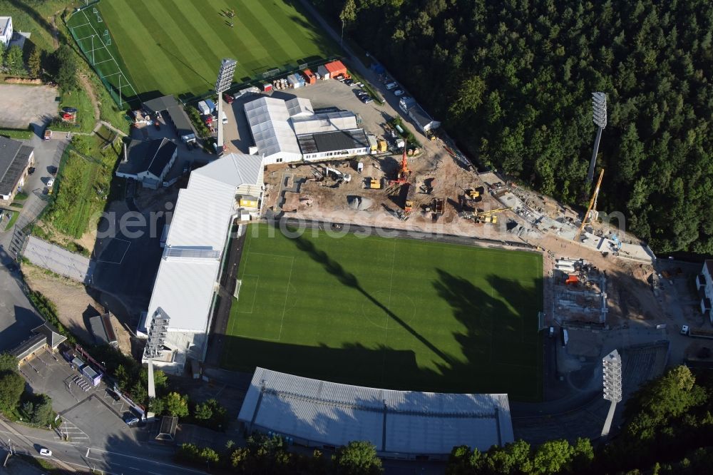 Aerial photograph Aue - Construction for the reconstruction of the Sparkassen-Erzgebirgsstadium of the FC Aue at the Auer Strasse in Aue in the state Saxony. building owner is the Erzgebirgskreis. The working group Stadium Aue includes ASSMANN BERATEN + PLANEN GmbH, Buero bpp, Inros Lackner and Phase 10