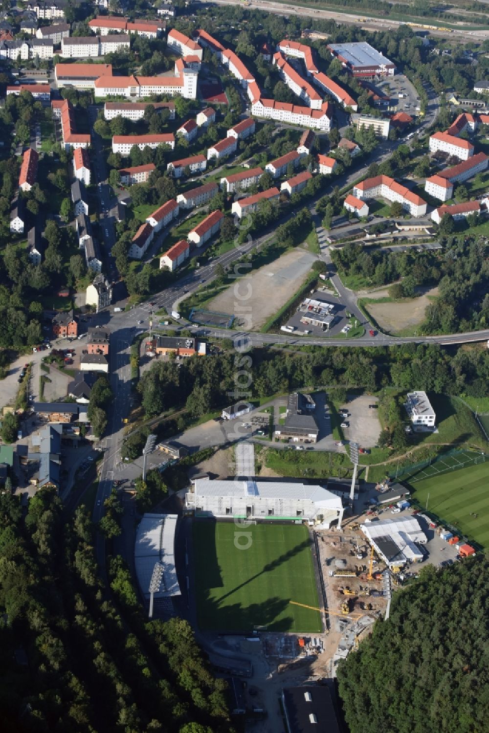 Aue from above - Construction for the reconstruction of the Sparkassen-Erzgebirgsstadium of the FC Aue at the Auer Strasse in Aue in the state Saxony. building owner is the Erzgebirgskreis. The working group Stadium Aue includes ASSMANN BERATEN + PLANEN GmbH, Buero bpp, Inros Lackner and Phase 10