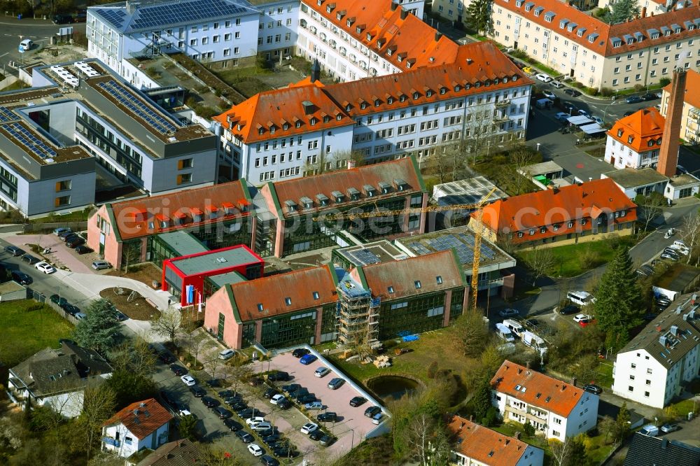 Würzburg from the bird's eye view: Construction for the reconstruction of the office building of the district administration Wuerzburg on Silcherstrasse in Wuerzburg in the state Bavaria, Germany