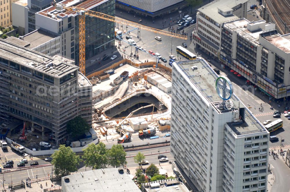 Berlin from the bird's eye view: Blick auf die Baustelle zum Zoofenster Hochhaus am Hardenbergplatz.Das Zoofenster ist ein im Bau befindliches Hochhausprojekt in Berlin-Charlottenburg am Hardenbergplatz. Die Grundsteinlegung erfolgte am 27. März 2009. Die Bausubstanz soll in der Höhe 118 m betragen. Das Gebäude soll neben Einzelhandelsläden in den unteren Geschossen hauptsächlich ein Hotel der Marke Waldorf-Astoria beherbergen, welches voraussichtlich 242 Zimmer bieten wird. Als Fertigstellungstermin für das zweithöchste Hochhaus im Berliner Westen wird Ende 2011 anvisiert. ALPINE BAU