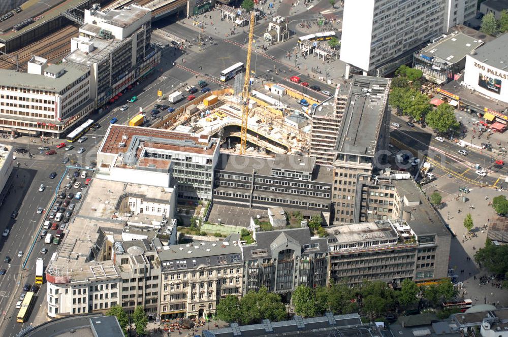 Berlin from the bird's eye view: Blick auf die Baustelle zum Zoofenster Hochhaus am Hardenbergplatz.Das Zoofenster ist ein im Bau befindliches Hochhausprojekt in Berlin-Charlottenburg am Hardenbergplatz. Die Grundsteinlegung erfolgte am 27. März 2009. Die Bausubstanz soll in der Höhe 118 m betragen. Das Gebäude soll neben Einzelhandelsläden in den unteren Geschossen hauptsächlich ein Hotel der Marke Waldorf-Astoria beherbergen, welches voraussichtlich 242 Zimmer bieten wird. Als Fertigstellungstermin für das zweithöchste Hochhaus im Berliner Westen wird Ende 2011 anvisiert. ALPINE BAU