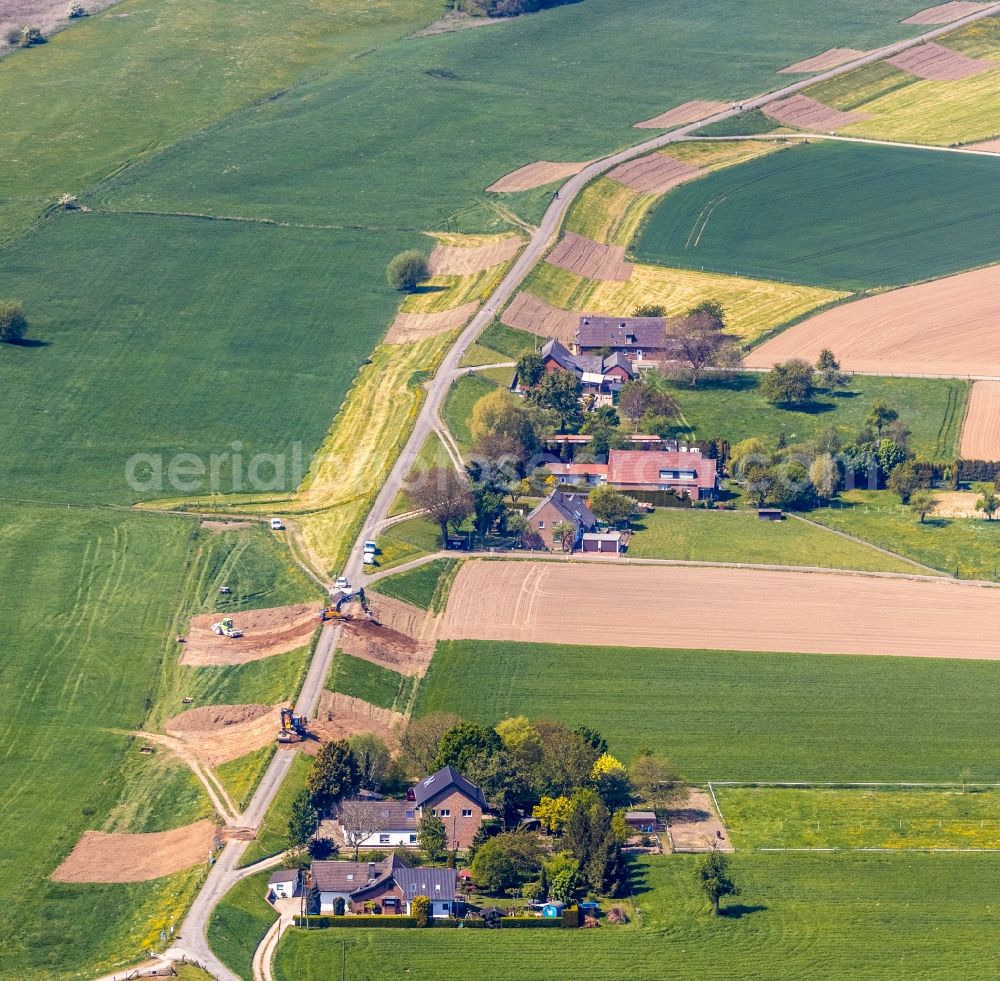 Aerial image Emmerich am Rhein - Construction site for the renewal and rehabilitation of the road and Deiches of Deichstrasse in the district Dornick in Emmerich am Rhein in the state North Rhine-Westphalia, Germany