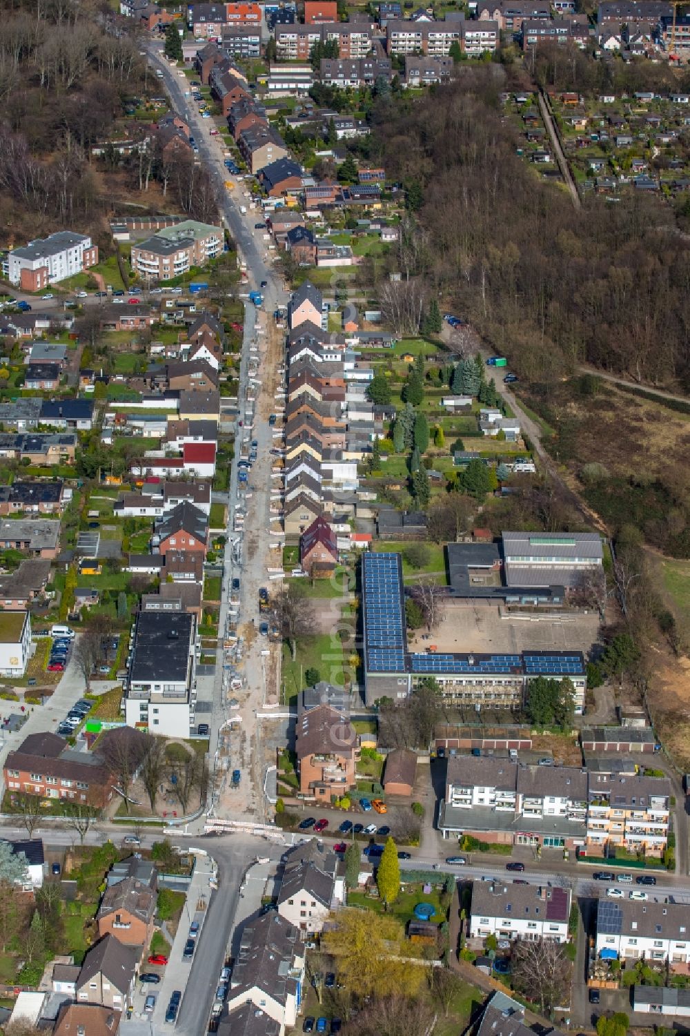 Bottrop from the bird's eye view: Construction site for the renewal and rehabilitation of the road Am Quellenbusch in Bottrop in the state North Rhine-Westphalia, Germany