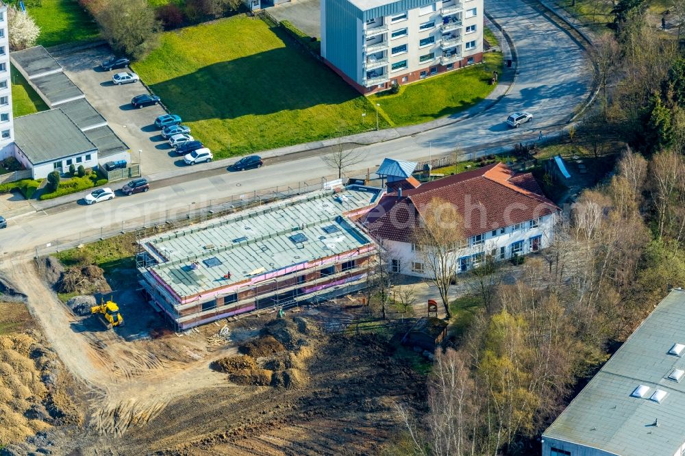 Arnsberg from above - New construction site for the construction of a kindergarten building and Nursery school Staedt. Kita Kleine Strolche Arnsberg Auf of Alm in Arnsberg in the state North Rhine-Westphalia, Germany