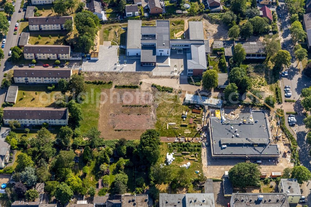 Aerial photograph Dinslaken - New construction site for the construction of a kindergarten building and Nursery school on Hagenstrasse in the district Eppinghoven in Dinslaken at Ruhrgebiet in the state North Rhine-Westphalia, Germany