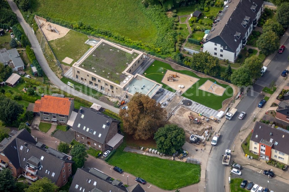 Essen from above - New construction site for the construction of a kindergarten building and Nursery school and property, designed by the architecture firm Dratz & Dratz in Essen in the state North Rhine-Westphalia, Germany