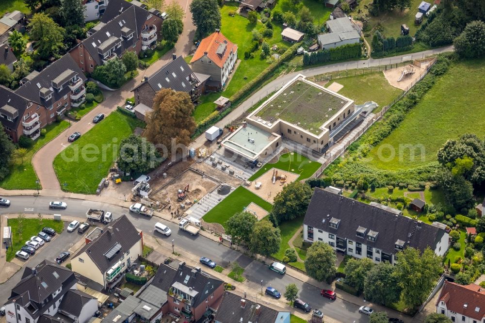 Essen from the bird's eye view: New construction site for the construction of a kindergarten building and Nursery school and property, designed by the architecture firm Dratz & Dratz in Essen in the state North Rhine-Westphalia, Germany