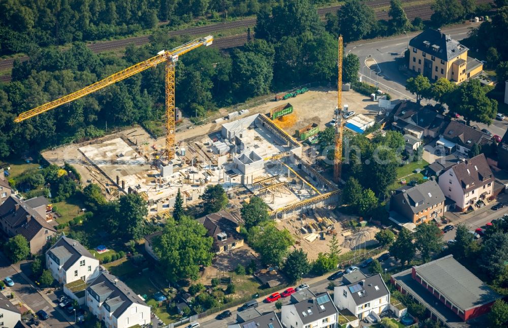 Aerial image Essen - New construction site for the construction of a kindergarten building and Nursery school Kath. Kindertagesstaette Herz Jesu on Leoplatz in Essen in the state North Rhine-Westphalia, Germany