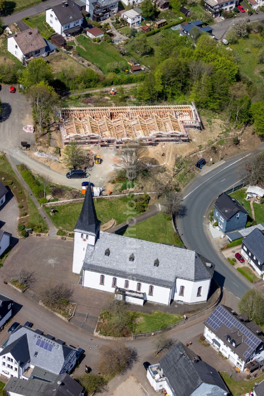 Irmgarteichen from the bird's eye view: New construction site for the construction of a ursery school St. Caecilia in Irmgarteichen in the state North Rhine-Westphalia, Germany