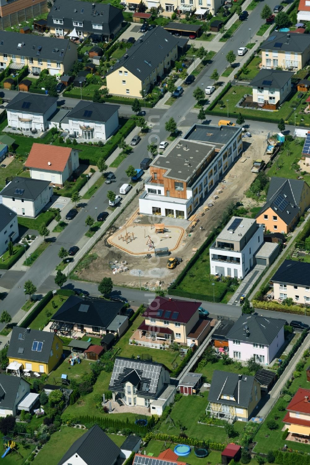 Berlin from the bird's eye view: New construction site for the construction of a kindergarten building and Nursery school of BIP Kreativitaetskita Schmetterlingswiesen on Rapsweisslingstrasse in the district Biesdorf in Berlin, Germany