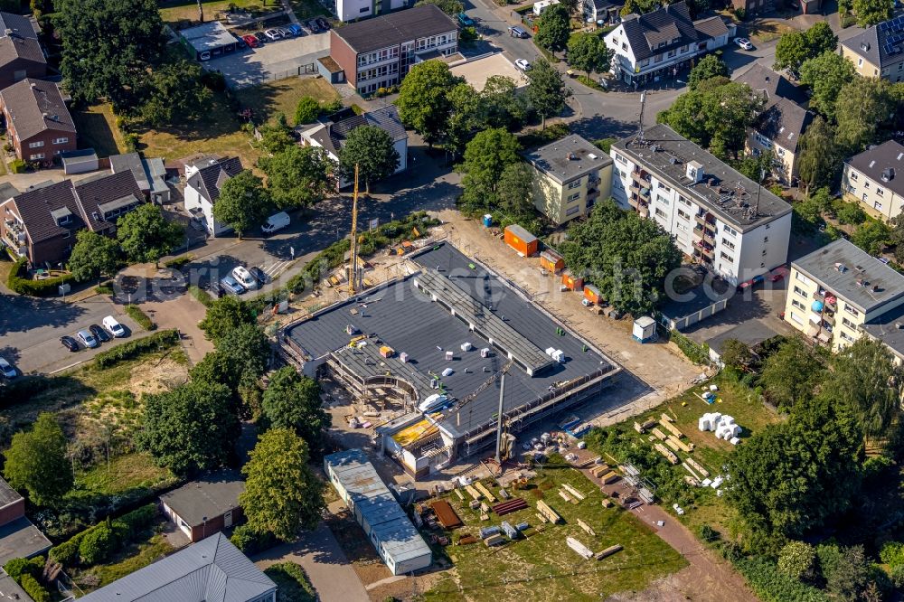 Dinslaken from the bird's eye view: New construction site for the construction of a kindergarten building and Nursery school on Hagenstrasse in the district Eppinghoven in Dinslaken in the state North Rhine-Westphalia, Germany