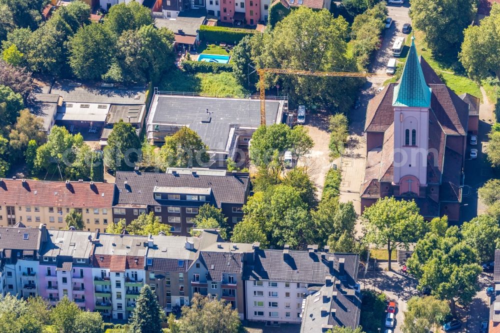 Aerial image Bochum - New construction site for the construction of a kindergarten building and Nursery school on Feldsieper Strasse overlooking the russian-orthodox church Heilige Dreifaltigkeit in the district Hamme in Bochum in the state North Rhine-Westphalia, Germany