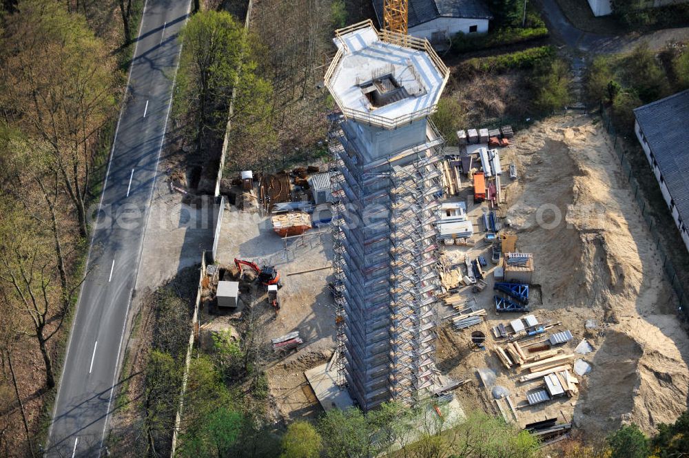 PRÖTZEL OT Heidekrug from the bird's eye view: Baustelle zur Errichtung eines Wetterradarturmes des DWD auf dem Gelände der ehemaligen Kaserne Heidekrug. Der durch die mib - märkische ingenieurbau gmbh errichtete Stahlbetonturm wurde eingerüstet durch die Frirma Schröter Gerüstbau. Construction site to build a weather radar tower of the DWD in the grounds of the former barracks Heidekrug.